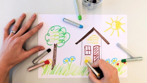 Abbildung von einem handgemaltem Bild mit Haus und Garten